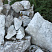 Kamenclub.ru: Мраморизированный известняк фр. 100-500 мм.  купить в Мытищах известняк серый белый темно-серый сероватый валун природного образования окатанный 10500 руб/т   фото КАМЕНЬ КЛУБ